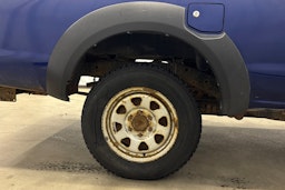 sininen Nissan NP300 2010 kuva 13.