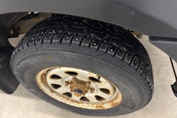 sininen Nissan NP300 2010 kuva 15.