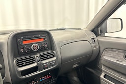 sininen Nissan NP300 2011 kuva 22.