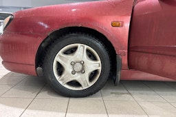 Punainen Nissan PRIMERA 1999 kuva 10.