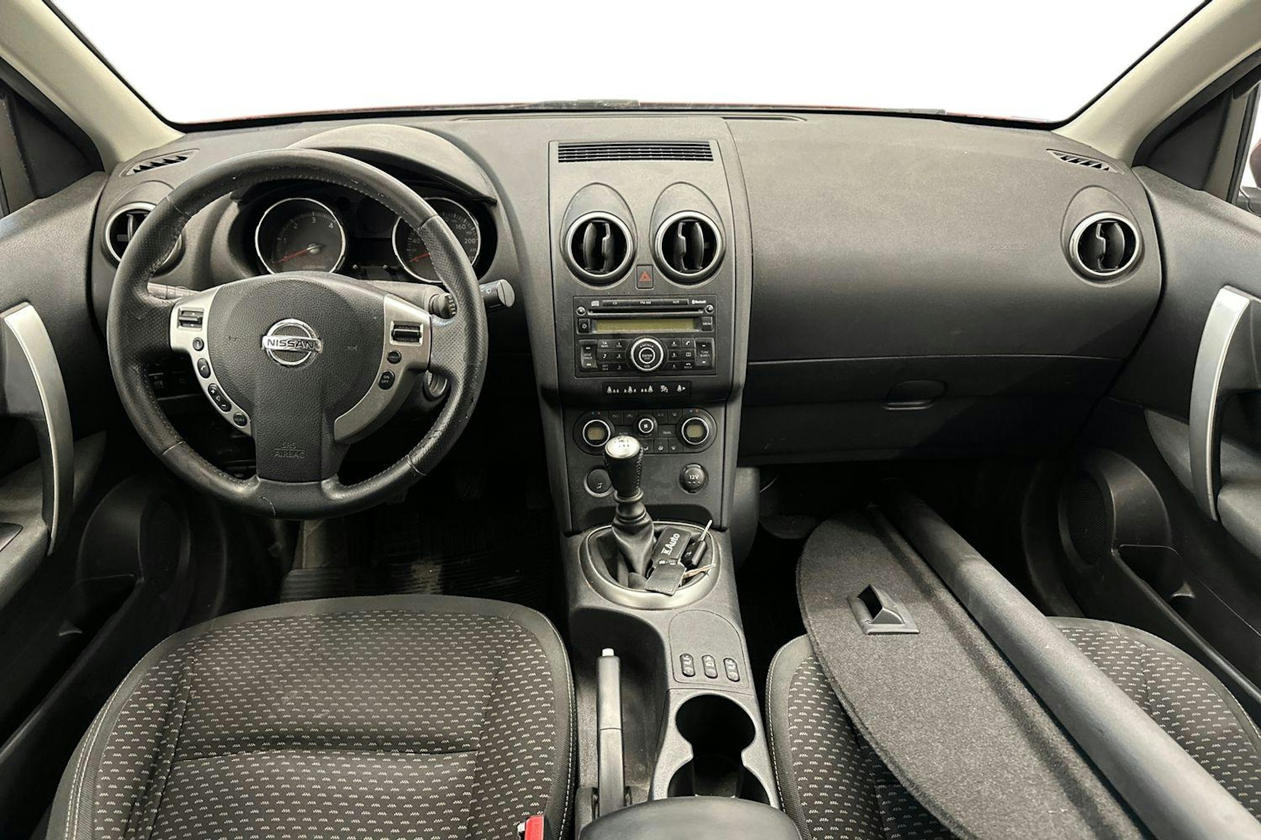Punainen Nissan Qashqai+2 2009 kuva 9.