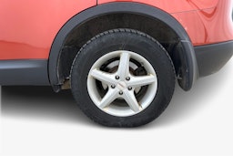 Punainen Nissan Qashqai+2 2009 kuva 11.