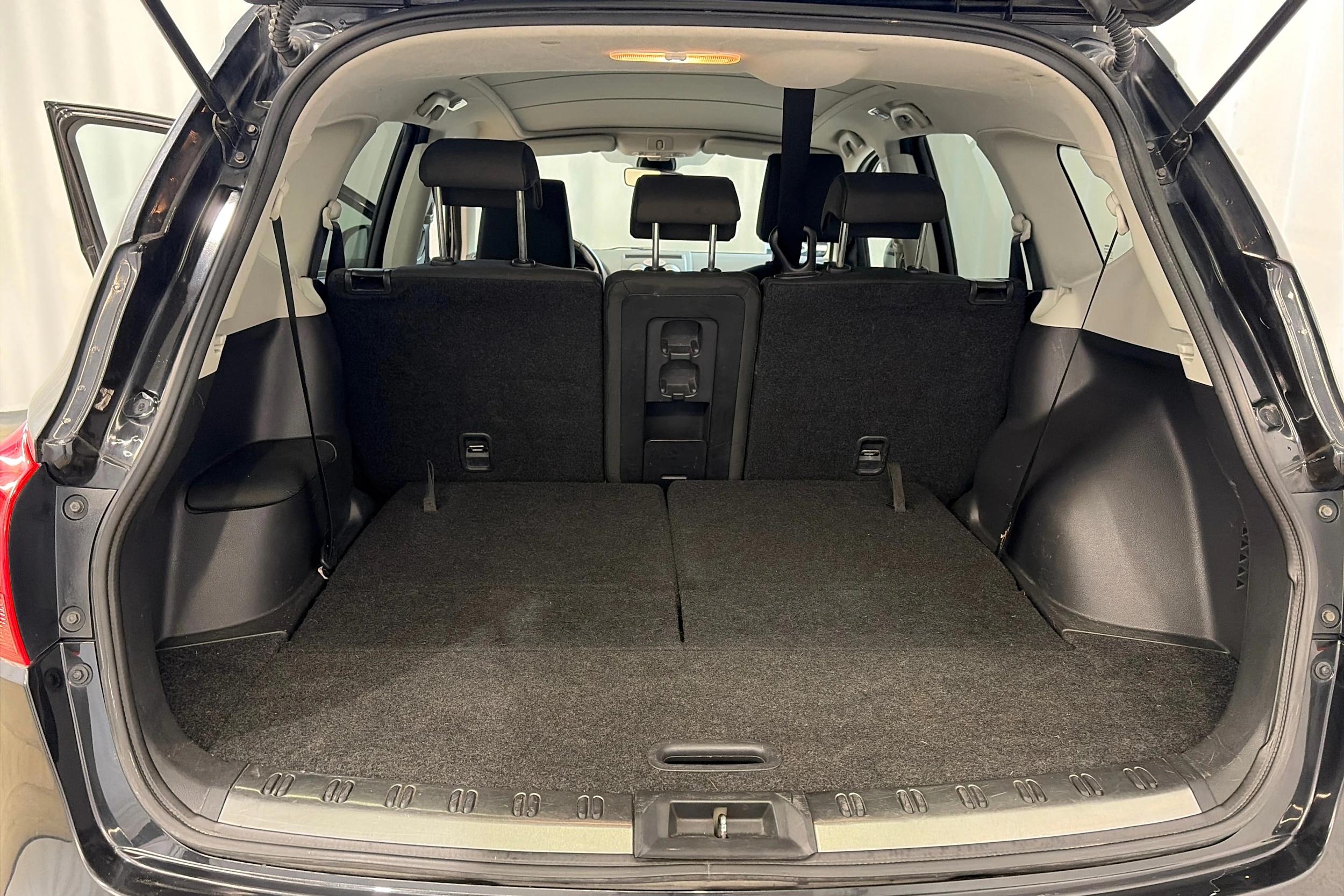 musta Nissan Qashqai+2 2010 kuva 23.