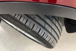 punainen Nissan Qashqai+2 2011 kuva 10.
