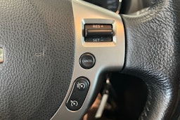 punainen Nissan Qashqai+2 2011 kuva 20.
