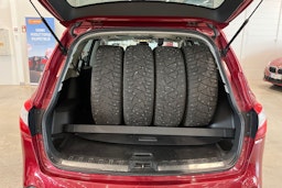 punainen Nissan Qashqai+2 2011 kuva 27.