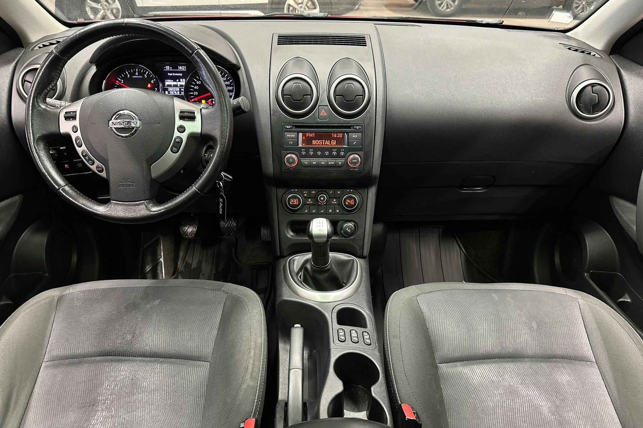 punainen Nissan Qashqai+2 2012 kuva 7.