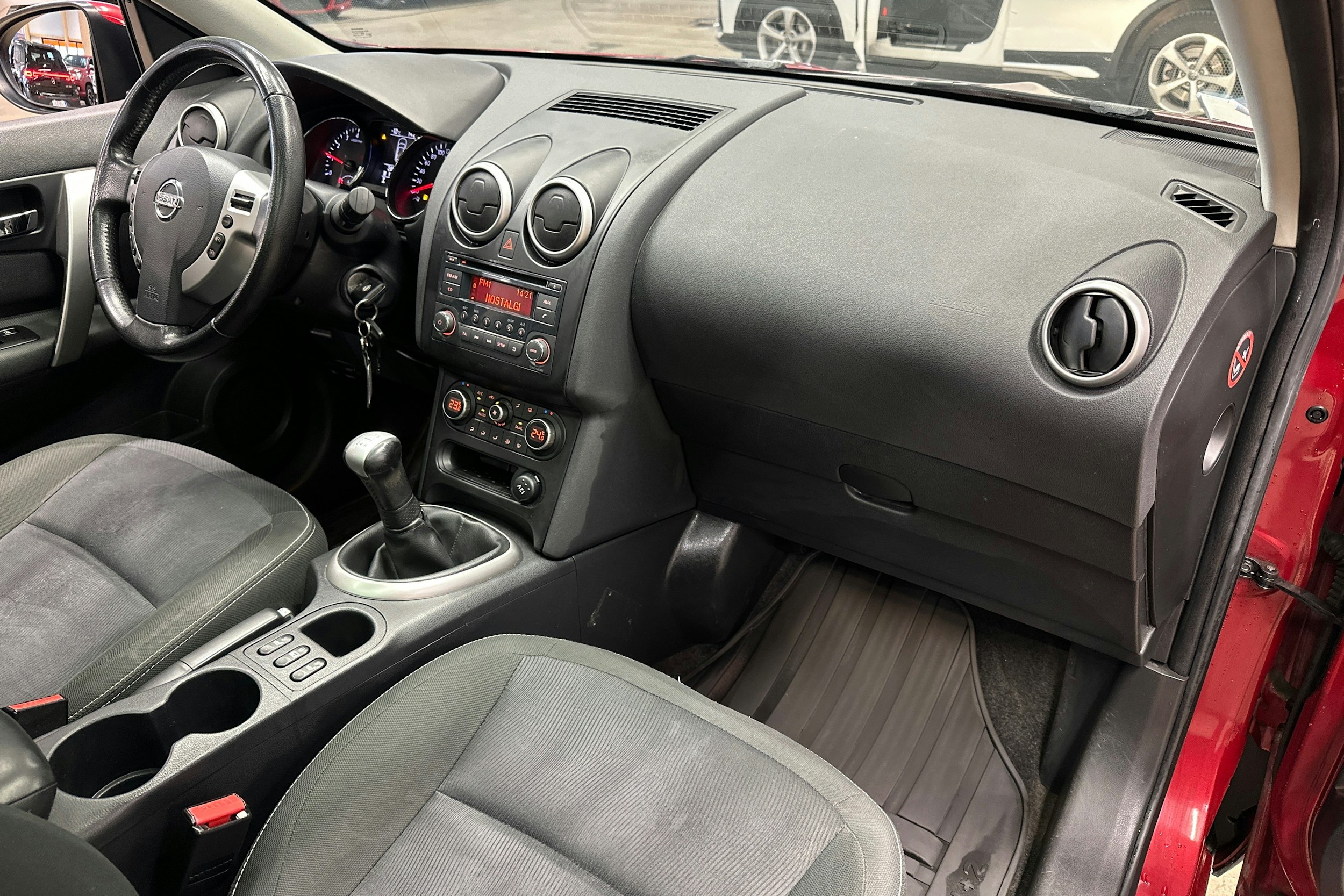 punainen Nissan Qashqai+2 2012 kuva 12.