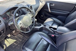 punainen Nissan Qashqai+2 2014 kuva 3.