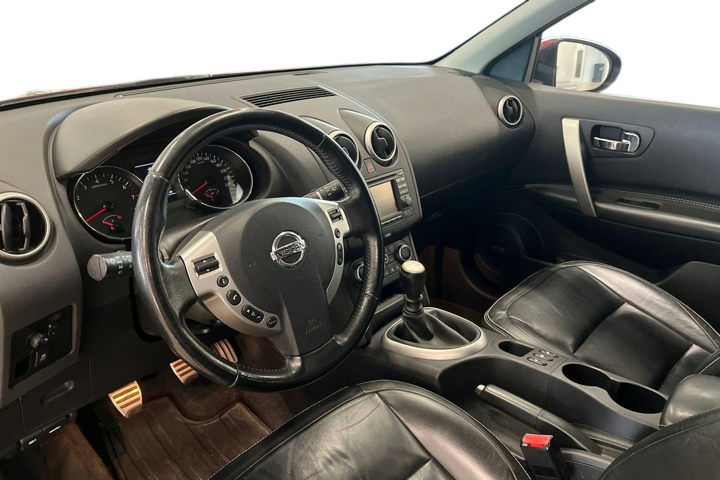 punainen Nissan Qashqai+2 2014 kuva 6.