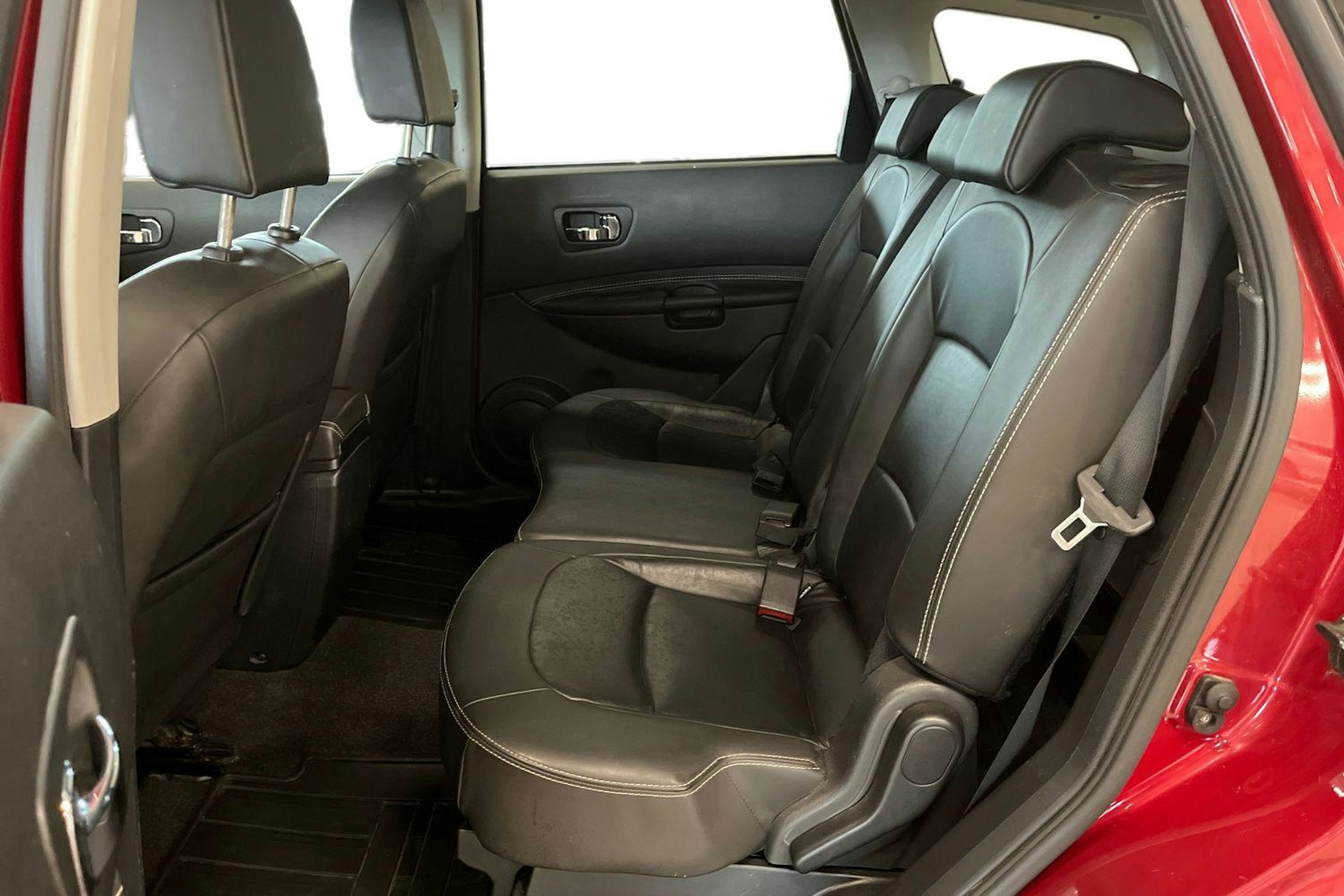 punainen Nissan Qashqai+2 2014 kuva 8.
