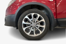 punainen Nissan Qashqai+2 2014 kuva 9.