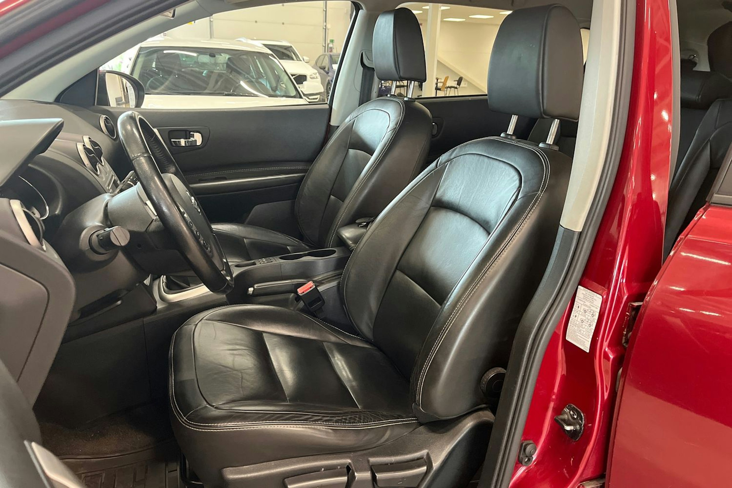 punainen Nissan Qashqai+2 2014 kuva 11.