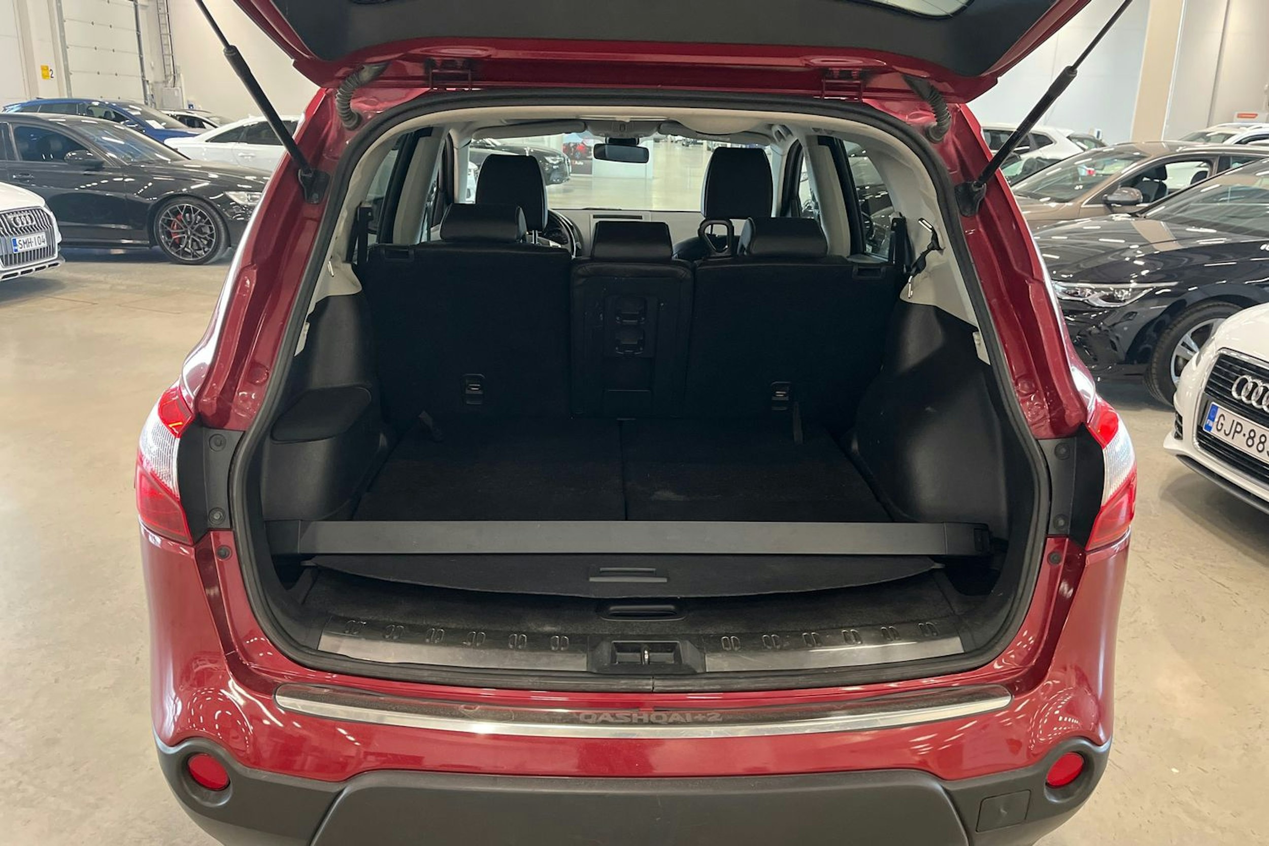 punainen Nissan Qashqai+2 2014 kuva 29.