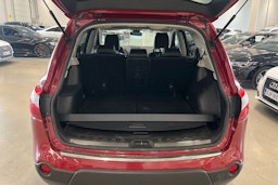 punainen Nissan Qashqai+2 2014 kuva 29.