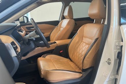 valkoinen Nissan X-TRAIL 2023 kuva 16.