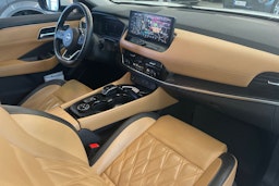 valkoinen Nissan X-TRAIL 2023 kuva 27.