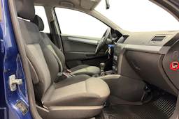 sininen Opel Astra 2006 kuva 9.