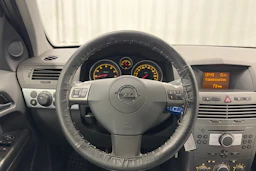sininen Opel Astra 2006 kuva 16.