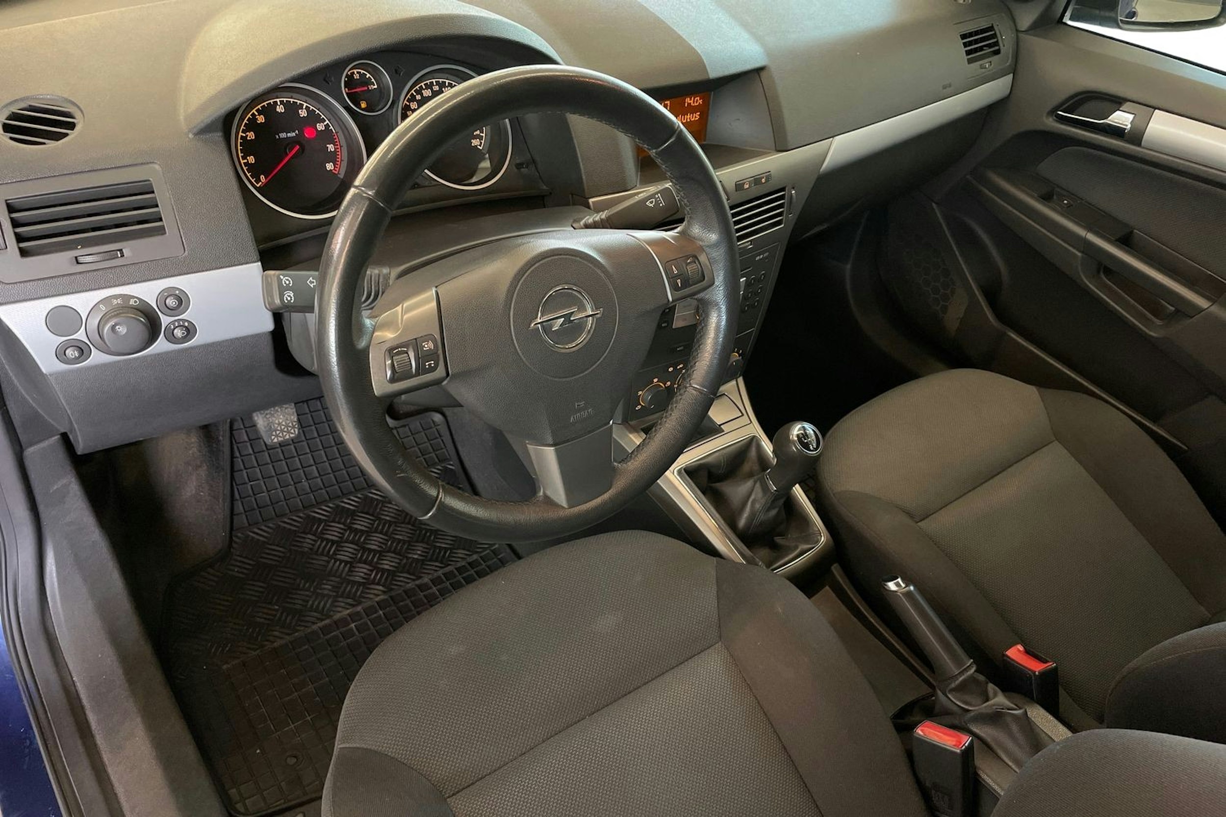 sininen Opel Astra 2006 kuva 7.