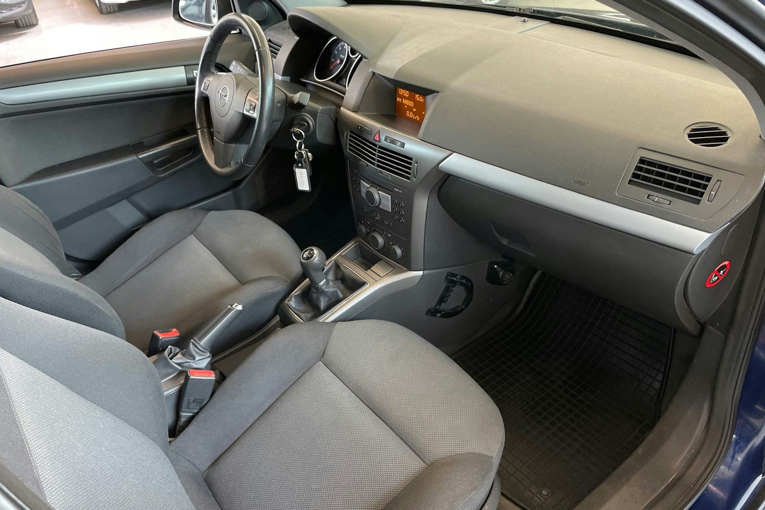 sininen Opel Astra 2006 kuva 22.