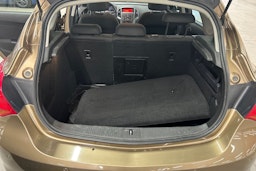 ruskea (beige) Opel Astra 2013 kuva 11.