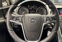 sininen Opel Astra 2015 kuva 12.