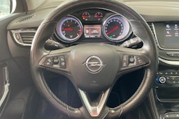 punainen Opel Astra 2016 kuva 15.