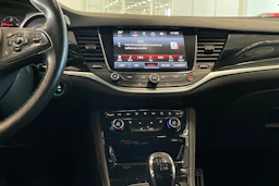 punainen Opel Astra 2016 kuva 15.
