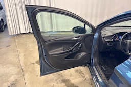 sininen Opel Astra 2016 kuva 33.