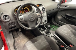 Punainen Opel CORSA 2011 kuva 7.