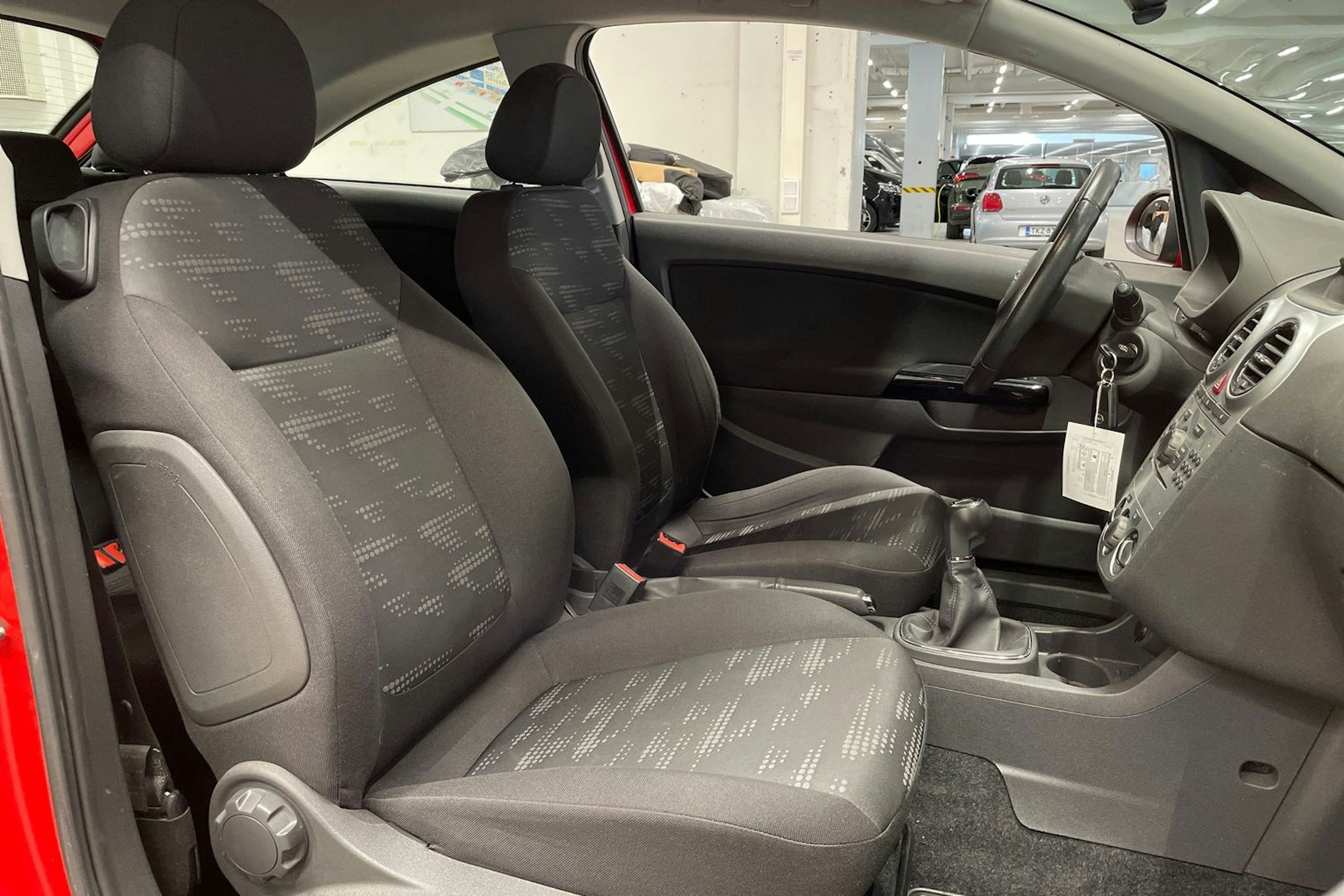 Punainen Opel CORSA 2011 kuva 22.
