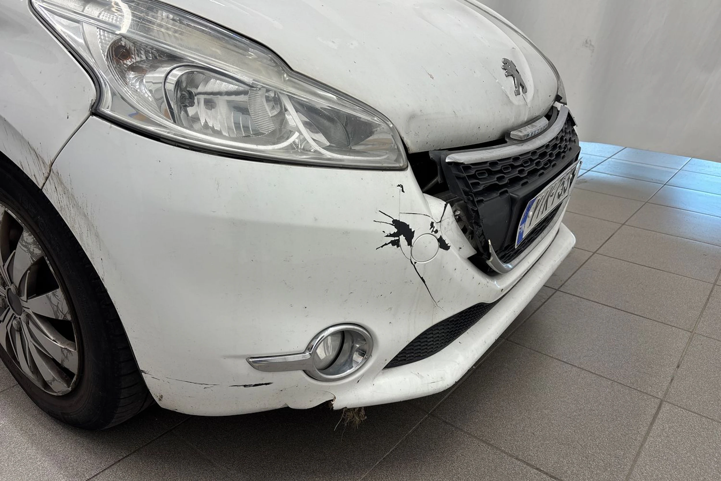Valkoinen Peugeot 208 2013 kuva 34.