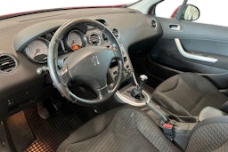 punainen Peugeot 308 2010 kuva 7.