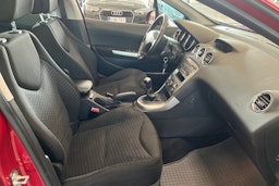punainen Peugeot 308 2010 kuva 17.