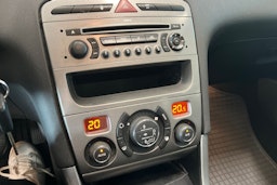 punainen Peugeot 308 2010 kuva 21.