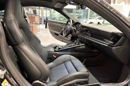 musta Porsche 911 2026 kuva 12.