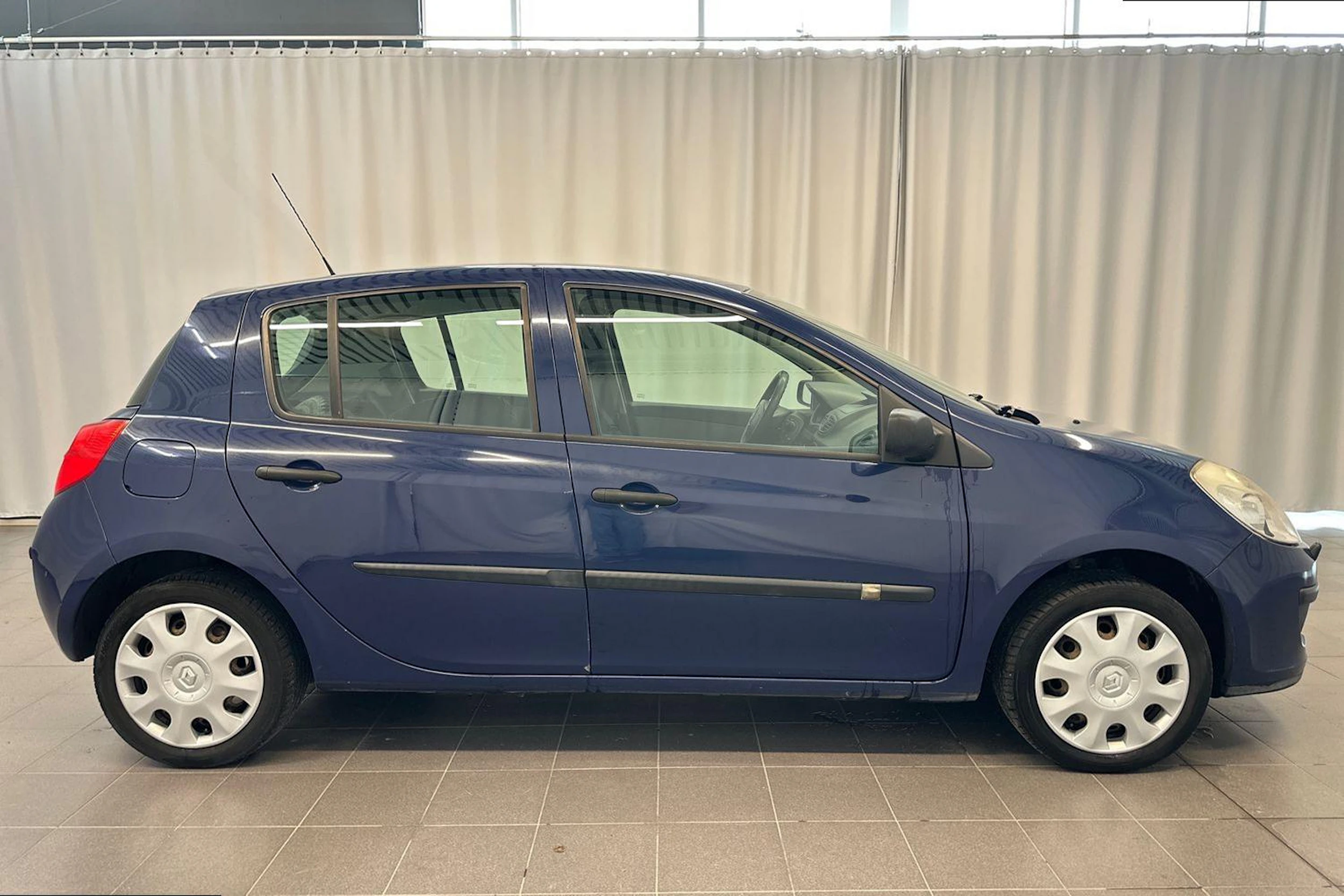 sininen Renault Clio 2006 kuva 8.