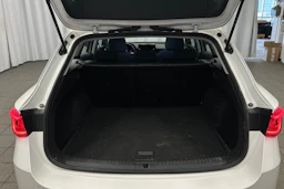 valkoinen SEAT Leon Sportstourer 2024 kuva 15.