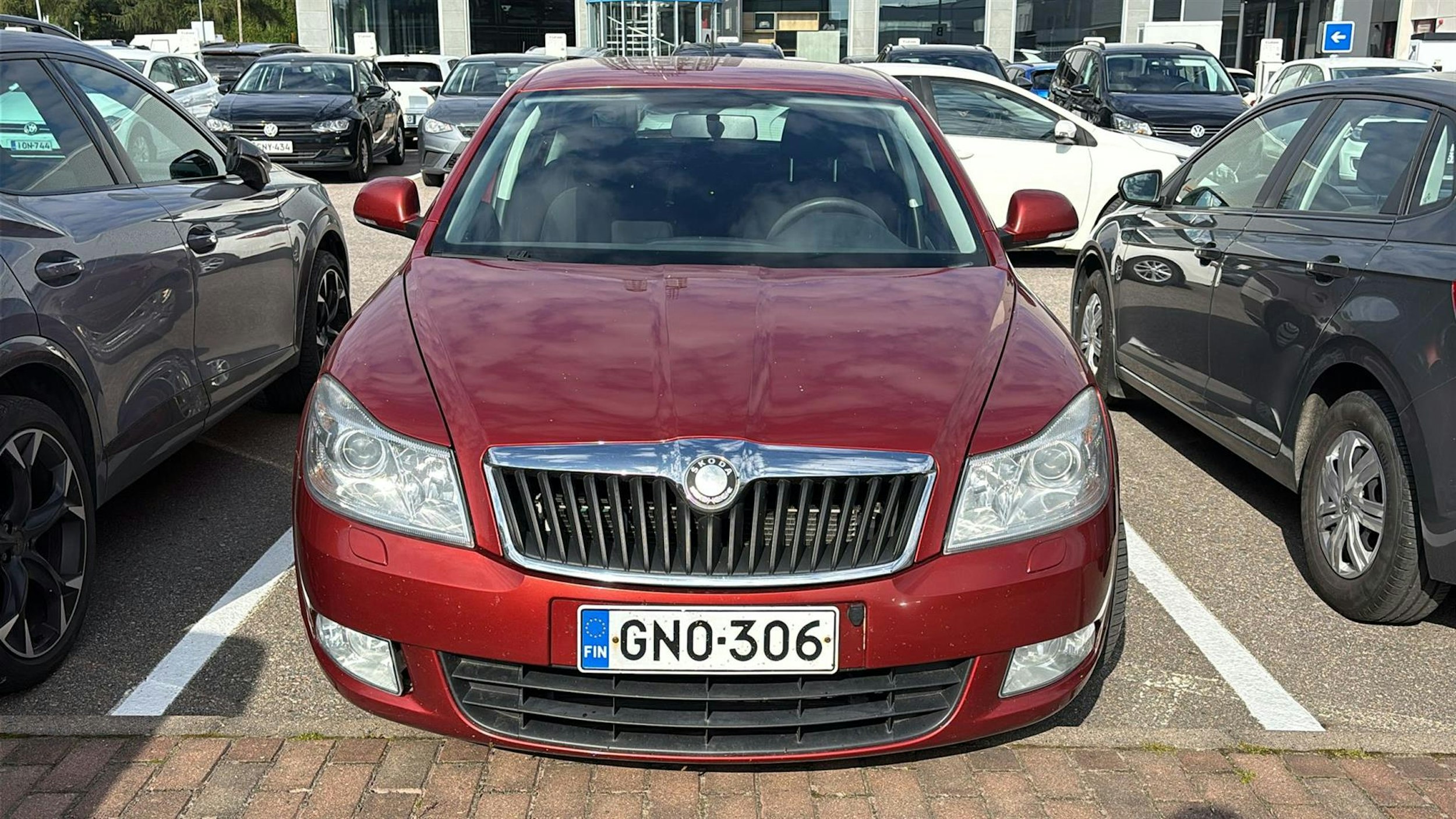 punainen Skoda Octavia 2010 kuva 2.