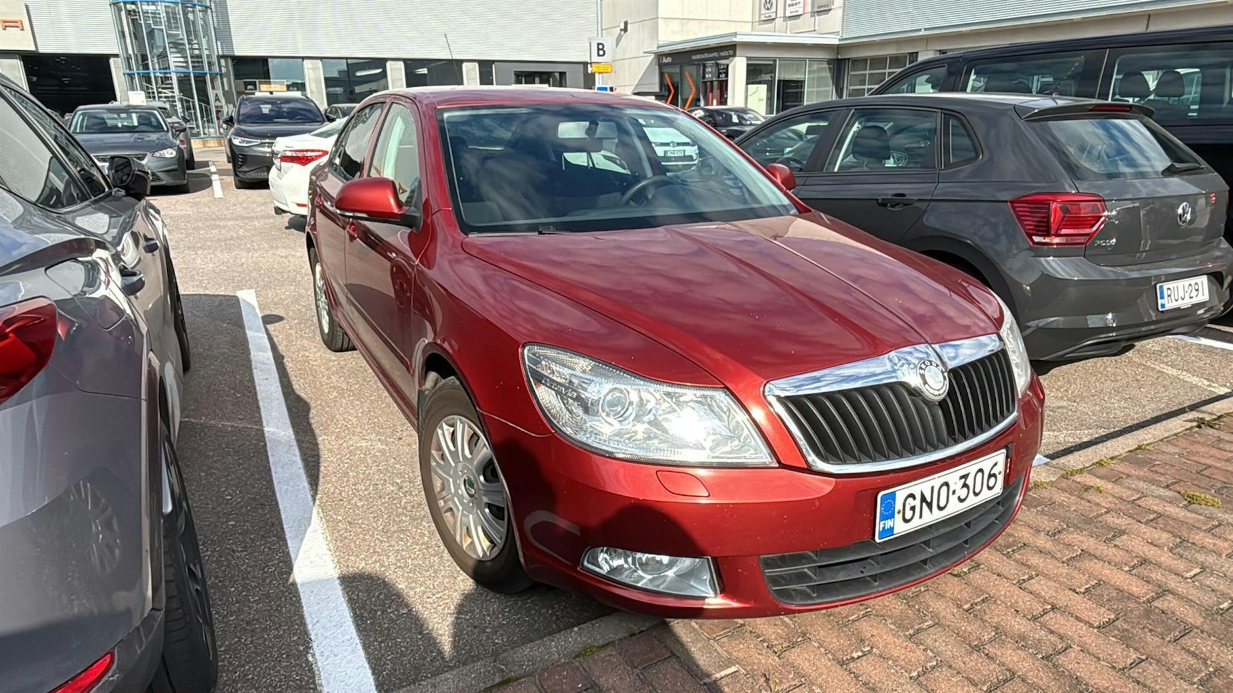 punainen Skoda Octavia 2010 kuva 3.