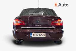 punainen Skoda Superb 2009 kuva 4.