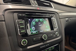 valkoinen Skoda Superb 2012 kuva 13.