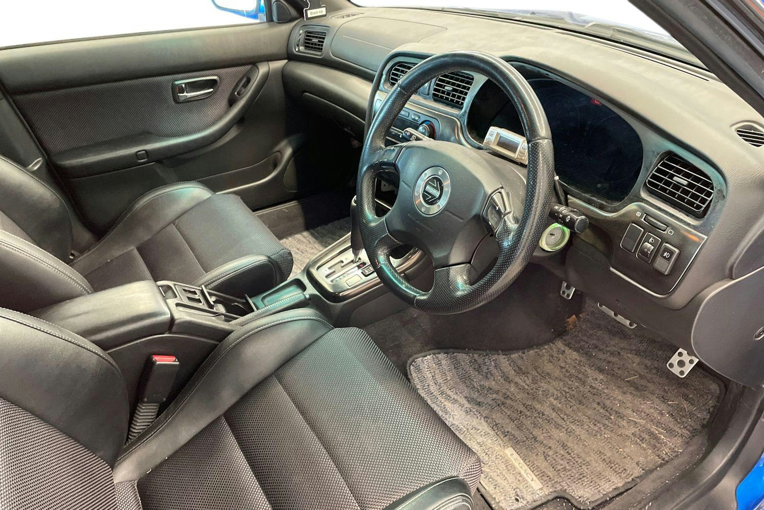 sininen Subaru Legacy 2003 kuva 3.