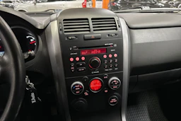 punainen Suzuki Grand Vitara 2009 kuva 17.