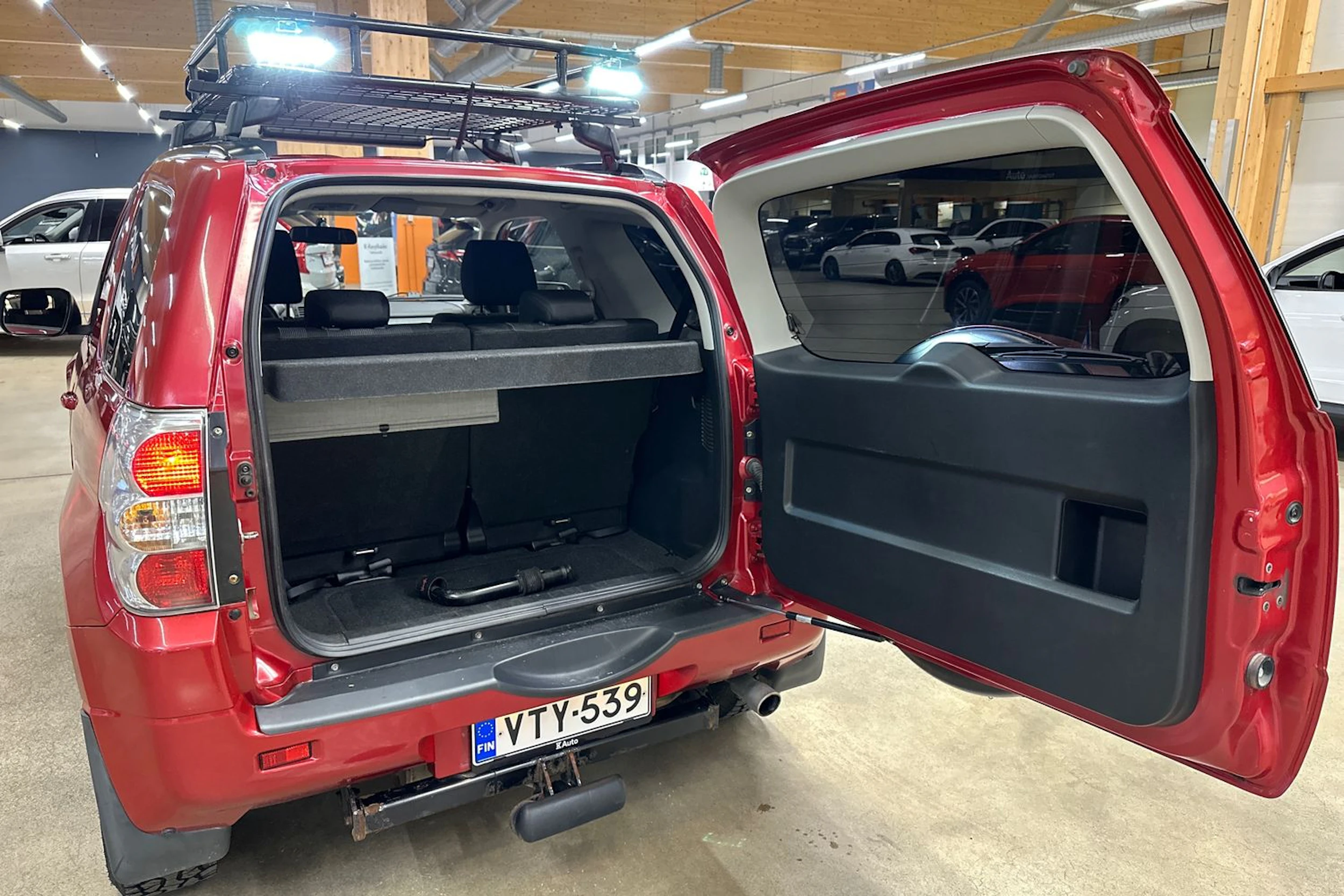 punainen Suzuki Grand Vitara 2009 kuva 26.