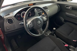 Oranssi Suzuki SWIFT 2008 kuva 7.