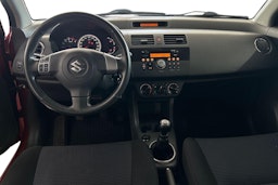 Oranssi Suzuki SWIFT 2008 kuva 9.