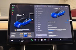 sininen Tesla Model 3 2019 kuva 17.