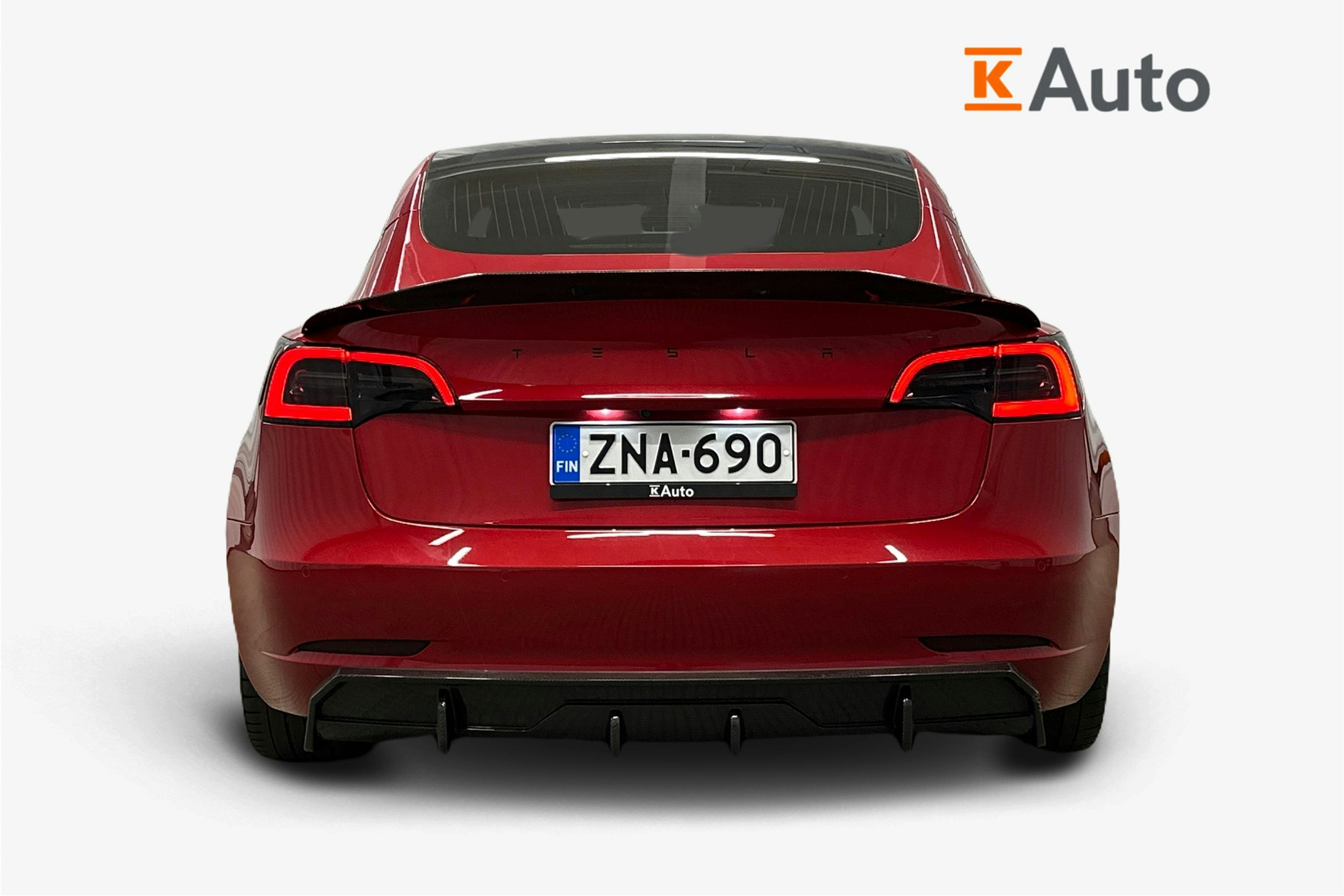 punainen Tesla Model 3 2020 kuva 3.